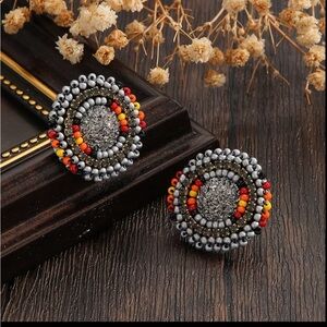 Elegant Beaded Earrings with Silver and Red Accents